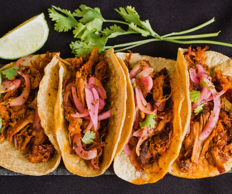 four delicious cochinita tacos